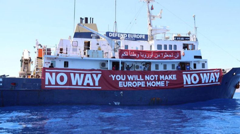 Anti-migrant ship puts out distress call and migrant rescue ship rushes to its aid