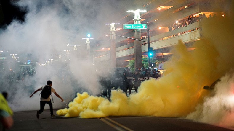Police fire tear gas at anti-Trump protesters after POTUS holds Phoenix rally