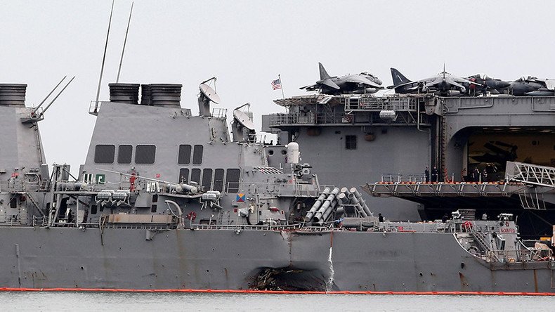 Missing USS McCain sailors identified, US Navy suspends search