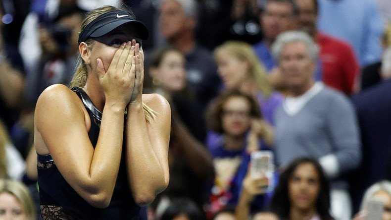 Sharapova stuns world no. 2 Halep in emotional Grand Slam return at US Open