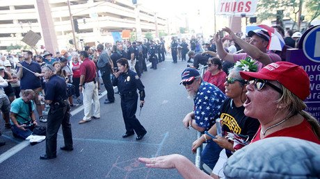 Insult to injury: Police arrest man who was struck in groin at Phoenix demo