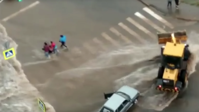 Flash flood in Russia carries away child in stroller, prompting desperate chase (VIDEO)