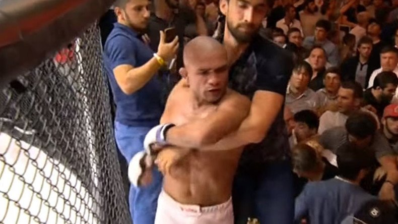 Ex-UFC fighter Diego Brandao flees cage after illegal blow enrages fans in Dagestan (VIDEO)