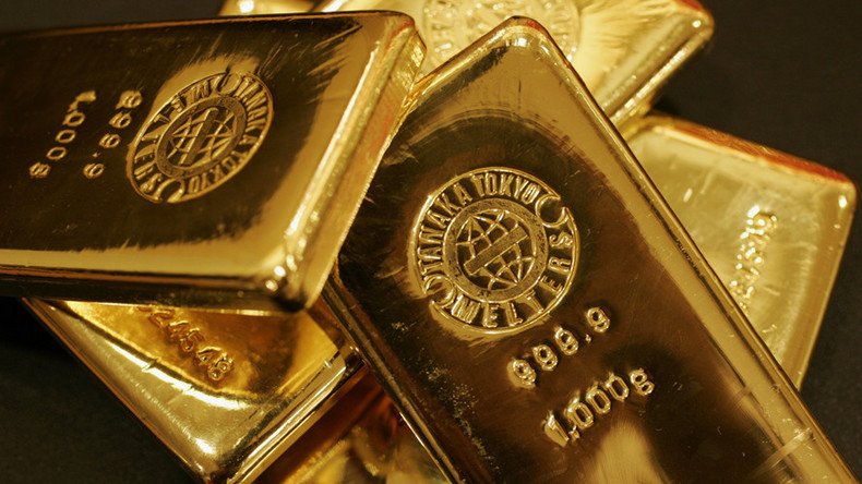 Gold surges to 1-yr high, dollar dips as N.Korea fears grow