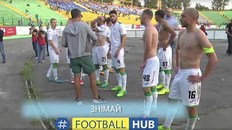 ‘You’re sh*t’: Ukrainian ultras strip own team of jerseys after crushing defeat (VIDEO)