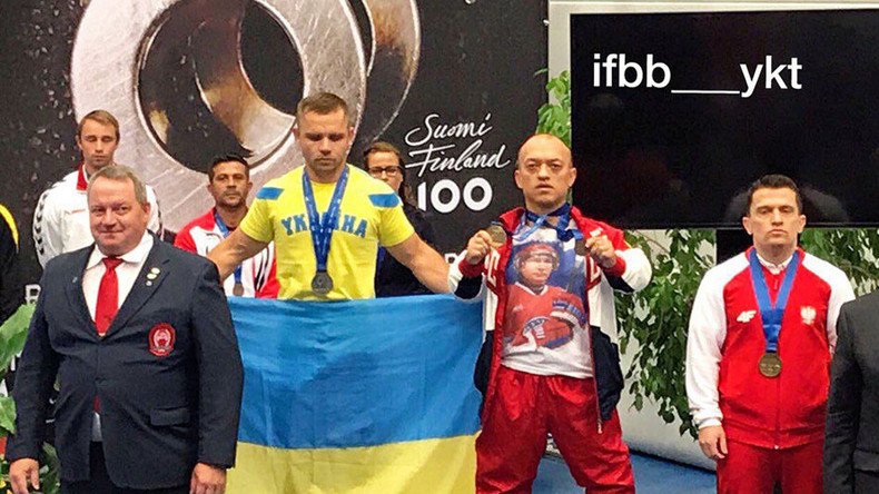 IPF briefly suspends Russian champion powerlifter for ‘lucky’ Putin t-shirt podium stunt
