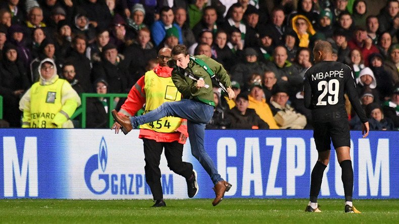 UEFA charges Celtic after fan runs onto pitch & aims kick at PSG striker