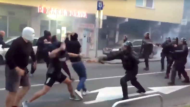Slovenian hooligans violently clash with police after attempting to attack Russian fans (VIDEO)
