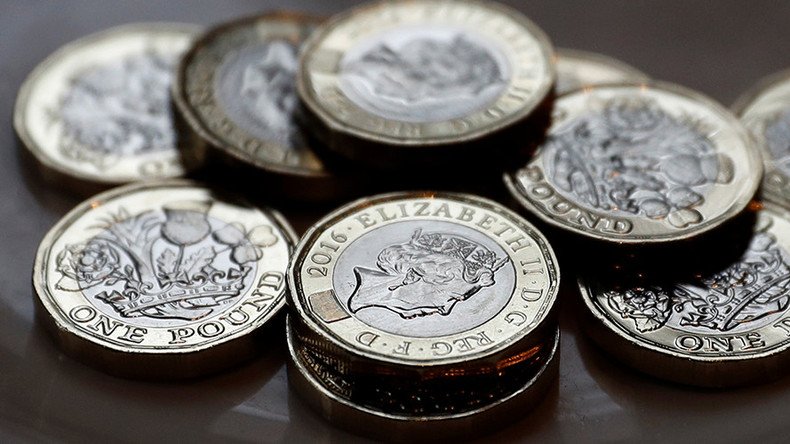 Pound at highest since Brexit as Bank of England signals rate hike