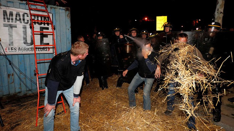 French farmers block Champs-Elysees protesting against ban on carcinogenic weedkiller