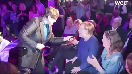 ‘Strange things happen every day:’ Merkel sings at election event (VIDEO)