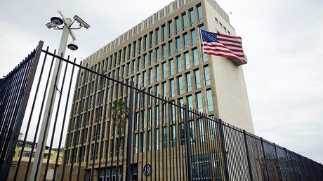 US urges no travel to Cuba, cuts embassy staff by more than half 