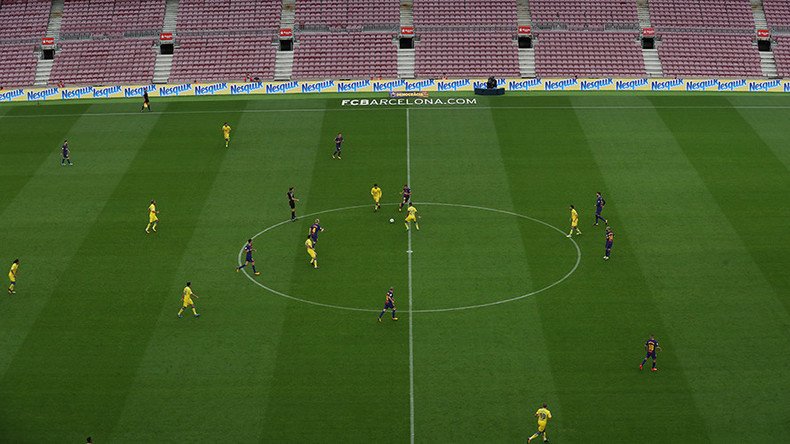 FC Barcelona plays in empty stadium as defiant Catalans go to polls despite crackdown