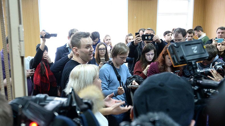 Navalny ally briefly detained over refusal to delete slander from internet