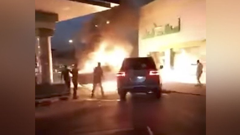 Blazing vehicle threatens to engulf gas station in stomach-churning video