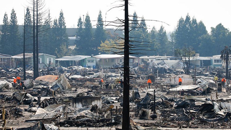Earthquake rocks N. California, as burning wildfires kill at least 34