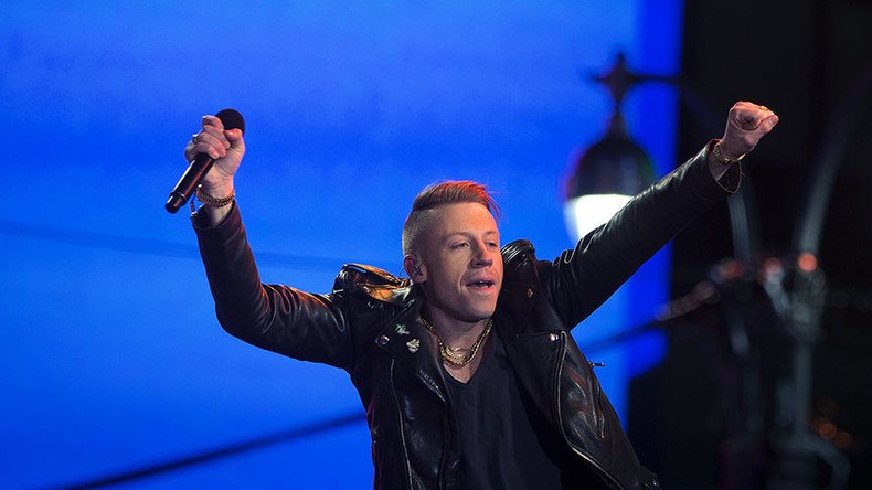 Macklemore calls for ‘kindness & acceptance,’ then leads crowd in ‘F**k Donald Trump' chant