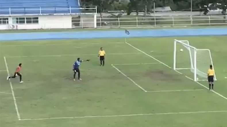 Goalkeeper celebrates penalty hitting crossbar, only for ball to bounce into empty goal! (VIDEO)