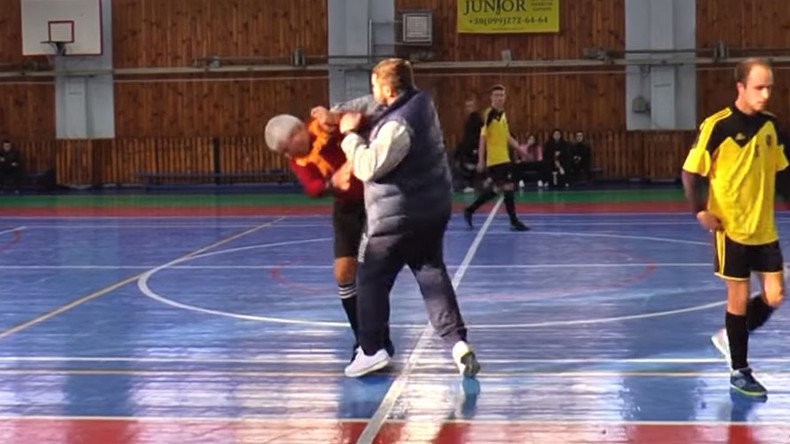 Futsal coach brutally attacks elderly referee in rage over red card (SHOCKING VIDEO)