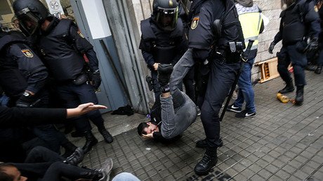 ‘Fake pics, limited use of force’: Spanish FM downplays police violence during Catalonia vote