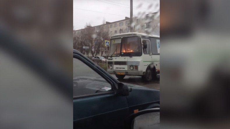 Hot wheels: ‘Unimpressed’ Russian man drives burning bus (VIDEO)