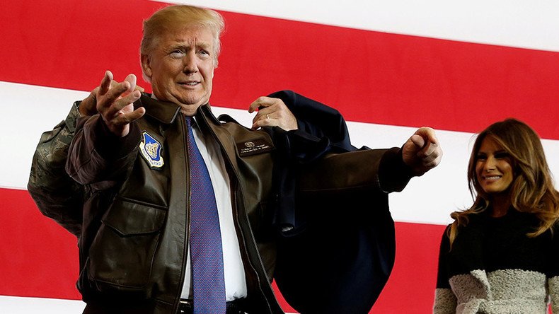 ‘You can have my jacket’: Trump casts off tailored attire for military wear on US base (VIDEO)