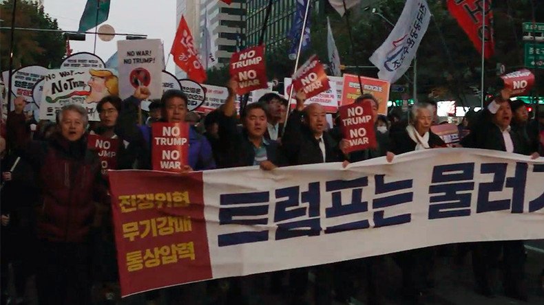 ‘No Trump, no war’: 1,000s of South Koreans rally for peace ahead of US president’s visit