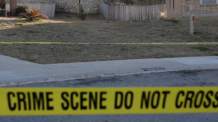 Baltimore neighborhood on lockdown as police hunt man who shot detective