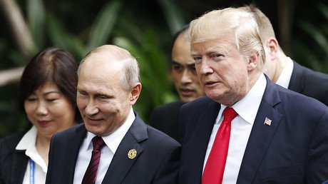 On the same page? Putin & Trump cross paths at APEC and chat cordially (VIDEO)