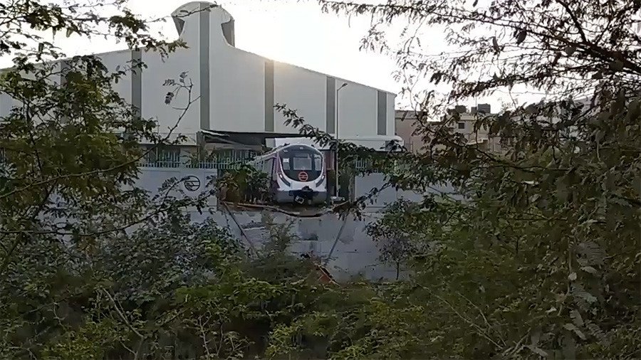 ‘Human error’: Indian driverless metro train plows through depot wall (VIDEO)