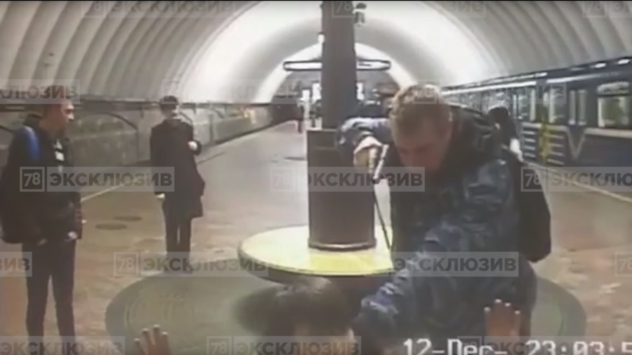 ‘I wasn’t sober’: Russian metro guard puts gun to head of ‘terrorist’ in middle of station (VIDEO)