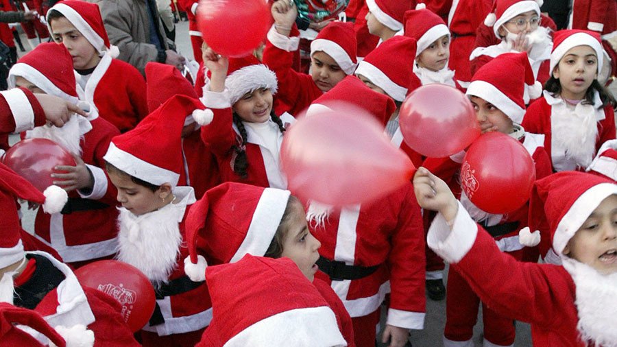 Little Santas flock onto Aleppo streets at Christmas, 1 year after liberation (PHOTOS)