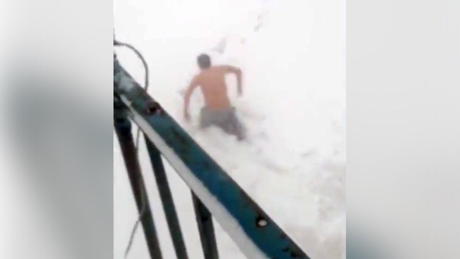 ‘4th floor is nothing, try jumping off the roof!’ Russian snow divers make use of winter weather