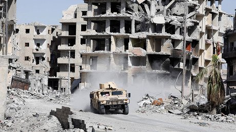 ‘Ghost town’: Residents of ‘liberated’ Raqqa left to rebuild their ruined city unaided