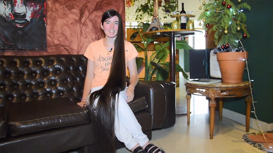 17yo Argentine 'Rapunzel' grows hair to Guinness record-breaking length  (VIDEO) — RT World News