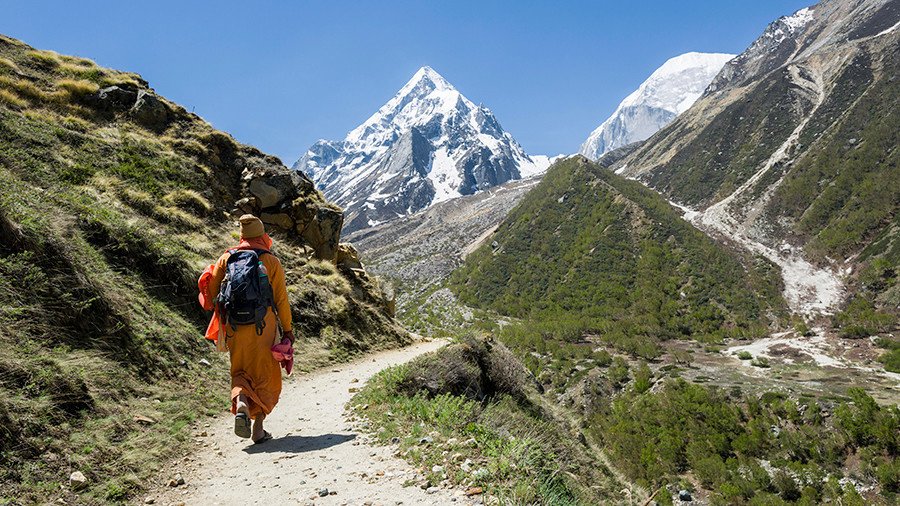 Defiant Indian father carves 8km through mountains to get his 3 sons to school