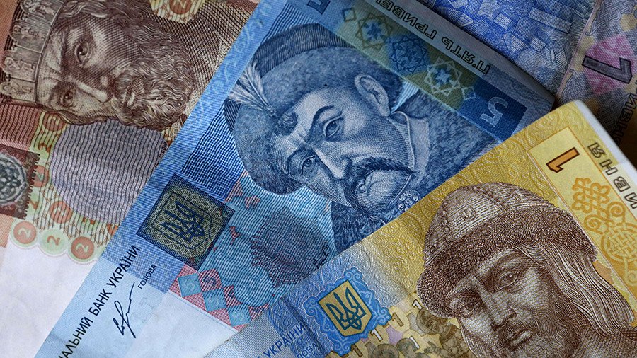 Ukrainian currency plunges to new record low