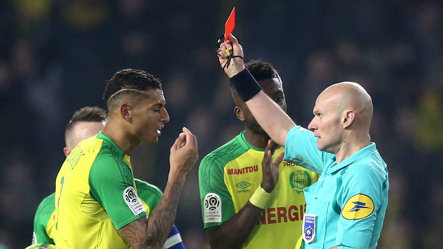 Ban for French football referee who kicked out at player before sending him off
