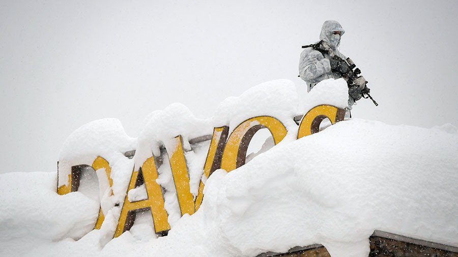 Can you dig it? Davos 'Masters of the Universe' bogged down under avalanche alert