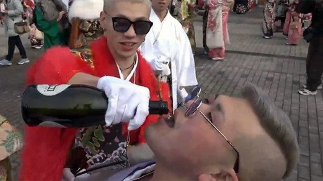 ‘Free boobs & wieners’: Pranksters offer public fondling on Tokyo streets