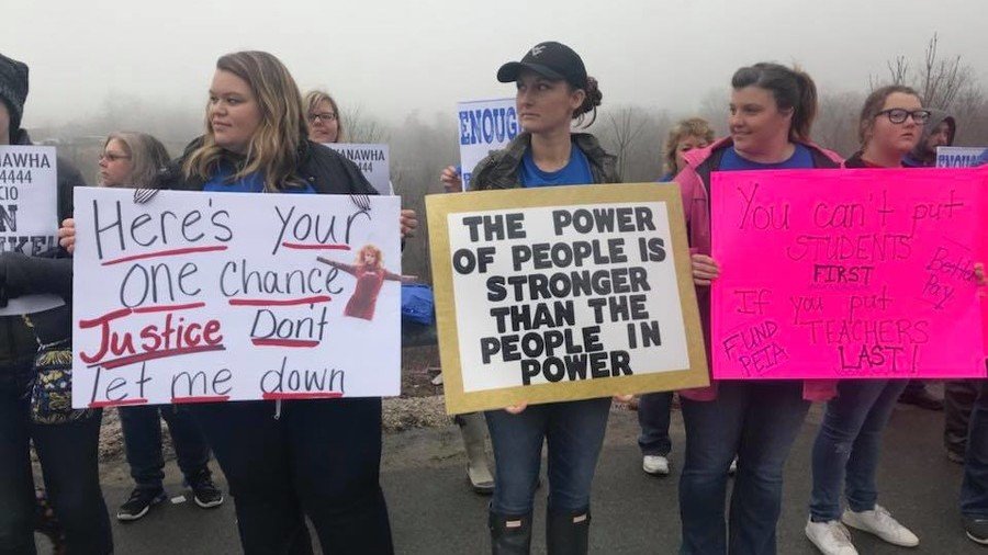 West Virginia teachers occupy streets in statewide strike