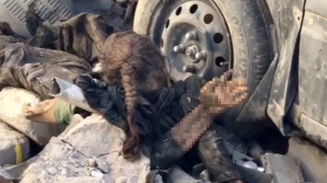 Girl in the rubble: Horrific image tells story of tragedy & neglect in liberated Mosul 