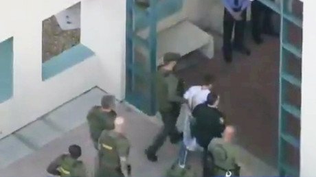 Florida school shooting suspect Nikolas Cruz arrives at Broward County jail (VIDEO) 
