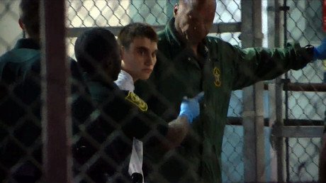 Police say Florida school shooter confessed, give details of how he almost got away