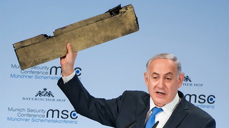 Netanyahu uses fragment of destroyed drone to taunt Iranian FM