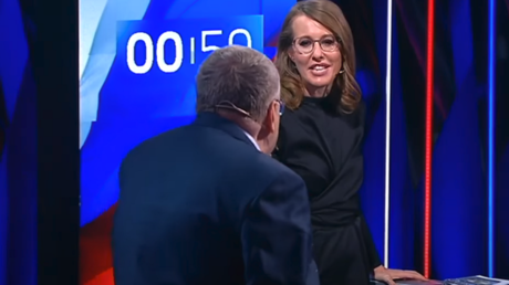 Slurs & water fly at Russian presidential debate as Lib Dem leader faces off with Sobchak