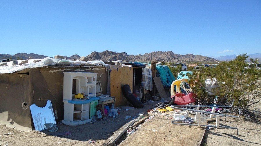 California couple arrested after police find children living in desert shelter