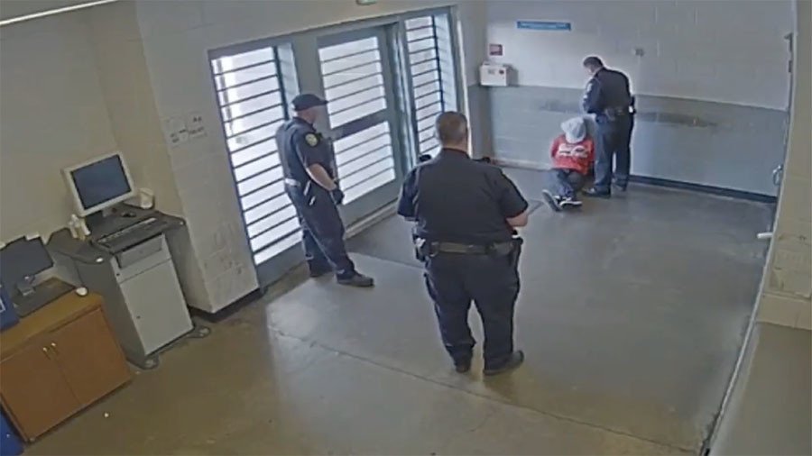 Prison guard caught on tape punching handcuffed man in the head (VIDEO)