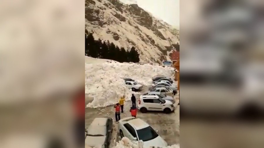 Avalanche buries cars in parking lot after roaring down Russia’s Mt Elbrus (VIDEO)