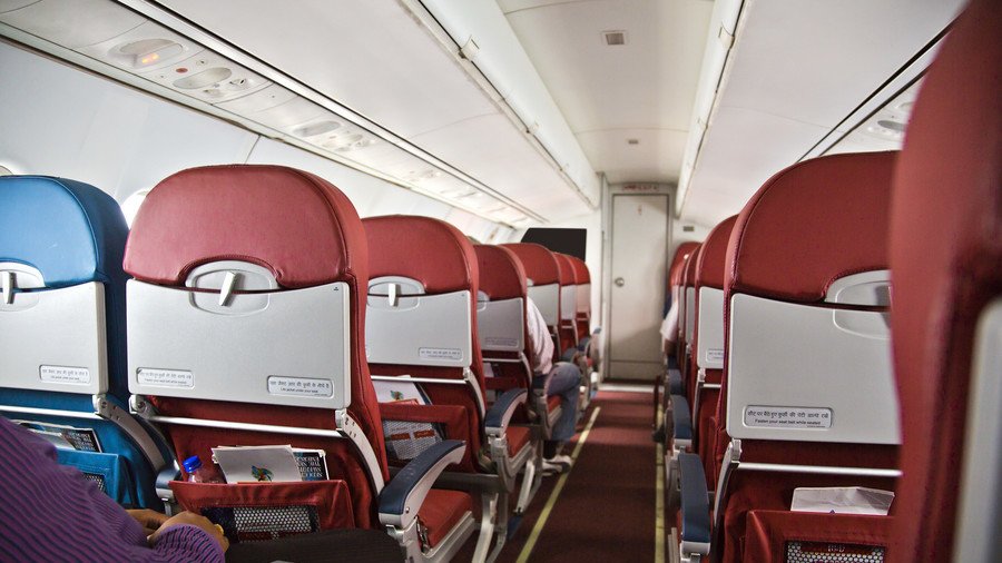 Sneeze on a plane: Where to sit to avoid catching pandemic influenza